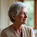 Portrait of Susan P., a thoughtful woman in her late 50s